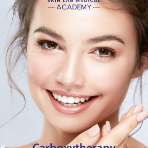 A smiling woman with flawless skin and glossy lips poses in a beauty treatment setting. She gently touches her face with manicured hands.