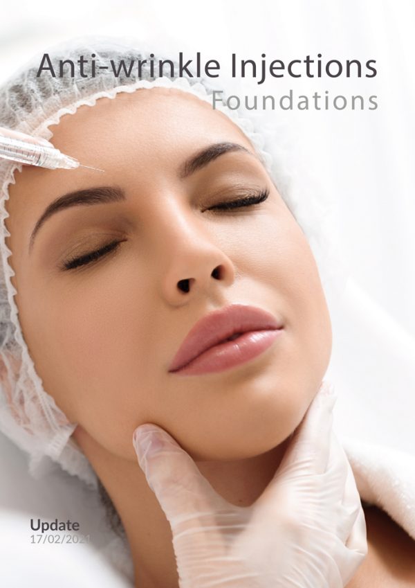 Close-up of a woman receiving an anti-wrinkle injection on her forehead. She is lying down with her eyes closed, wearing a disposable hair cap. A practitioner wearing transparent gloves gently supports her chin.