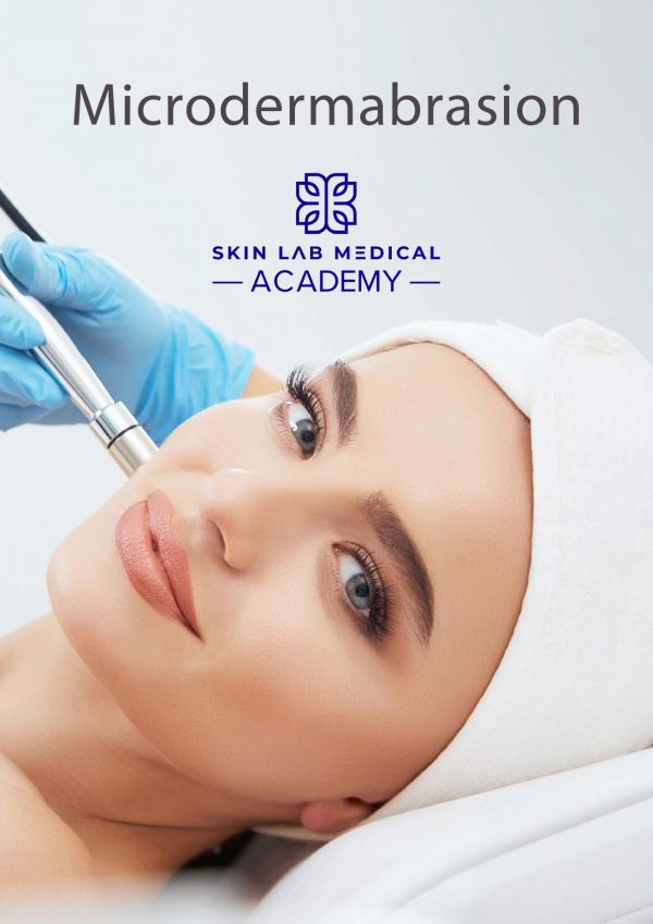 Smiling woman receiving a microdermabrasion facial treatment from a gloved professional at Skin Lab Medical Academy.