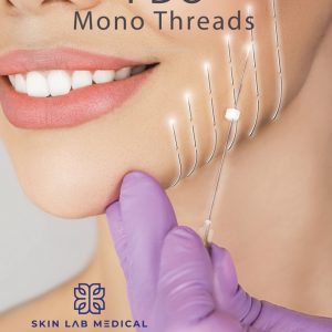 Smiling woman receiving PDO mono thread treatment in the lower cheek area at Skin Lab Medical Academy.