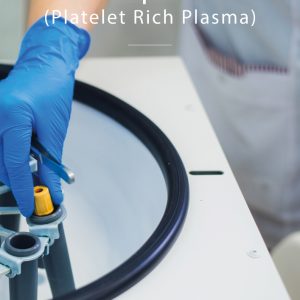 Gloved hand placing a blood sample into a centrifuge for PRP Vampire Facial preparation at Skin Lab Medical Academy.