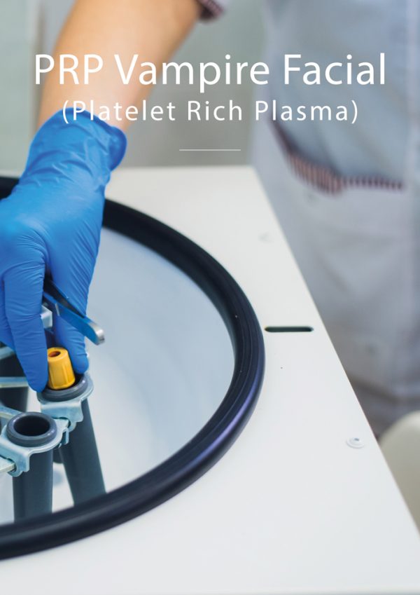 Gloved hand placing a blood sample into a centrifuge for PRP Vampire Facial preparation at Skin Lab Medical Academy.