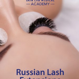 Close-up of a client receiving Russian lash extensions at Skin Lab Medical Academy, with under-eye pads in place.